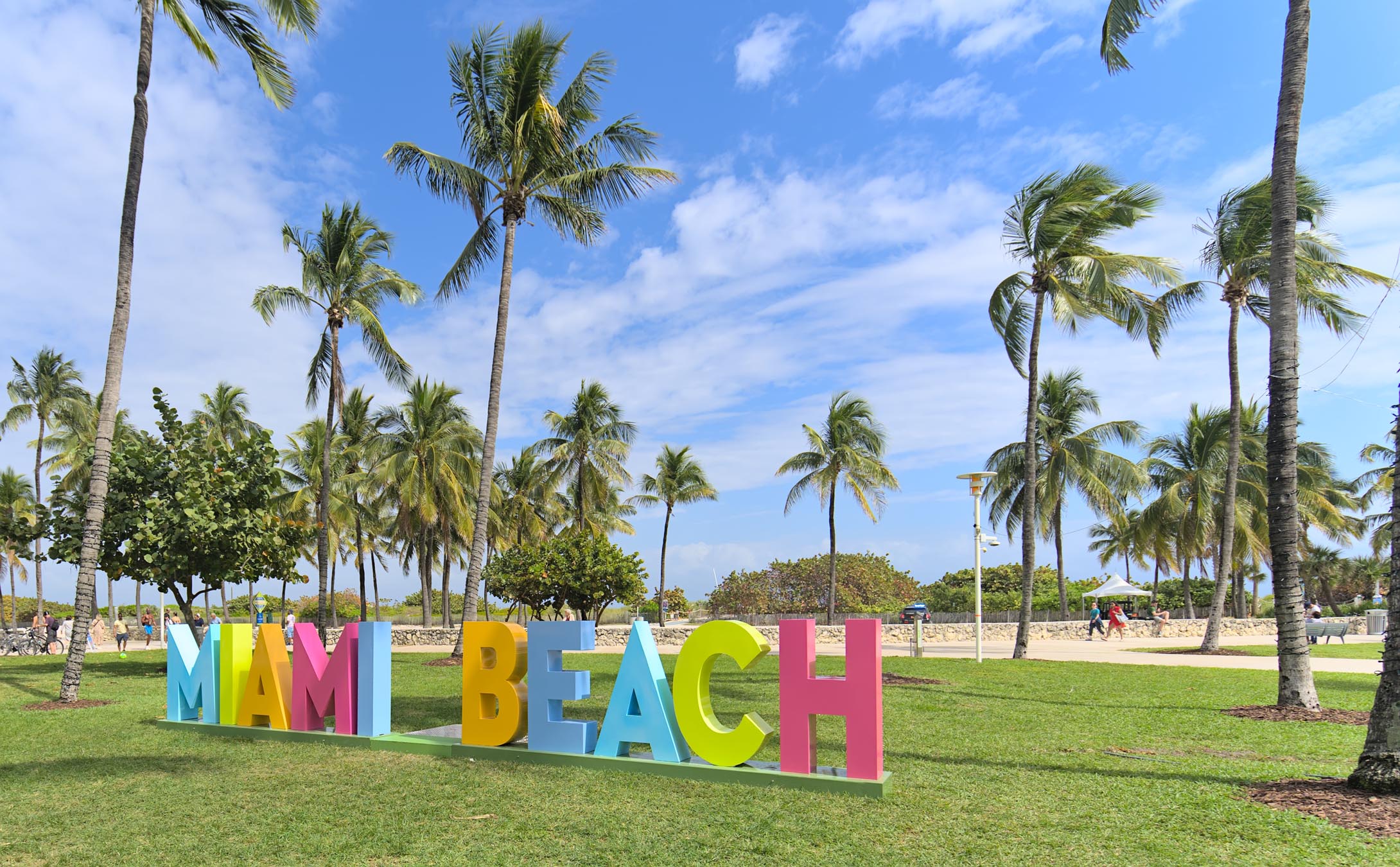 Miami Beach sign with palm trees